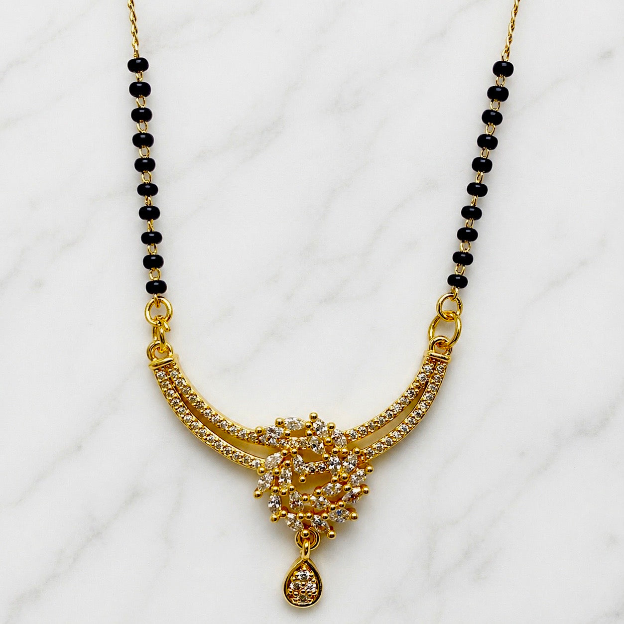 Elegant Curved AD Mangalsutra Pendant – 18K Gold Plated