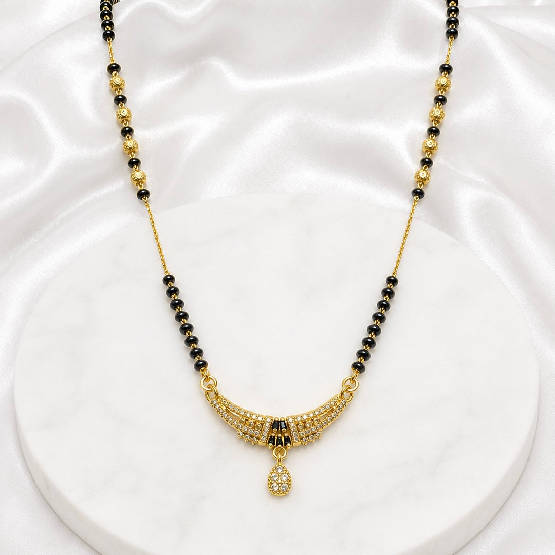 Premium Curved 18K Gold Plated AD Anti-Tarnish Mangalsutra Pendant with Black Stone Accents