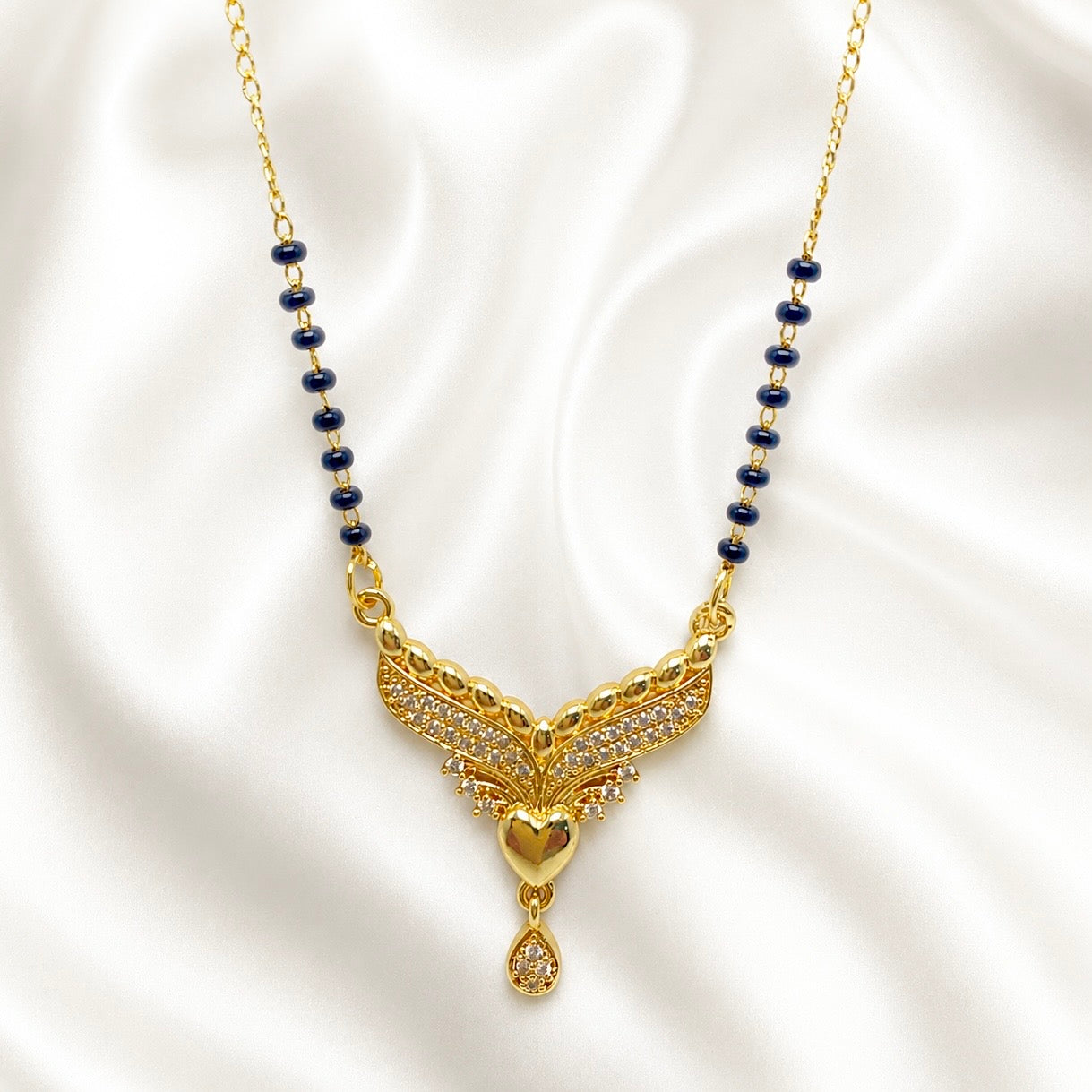 Elegant AD Winged Heart Mangalsutra Pendant – 18K Gold Plated