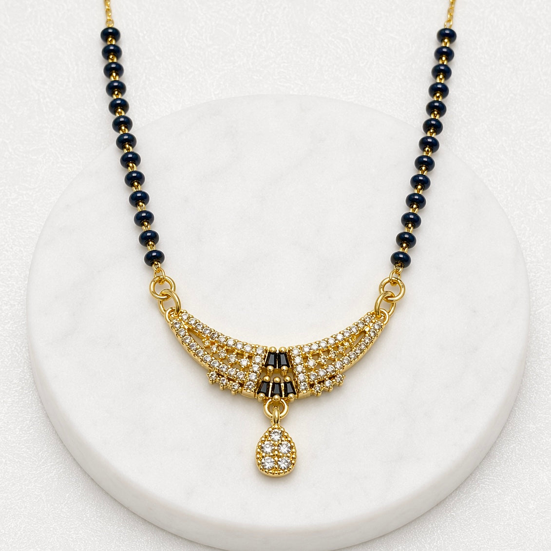 Premium Curved 18K Gold Plated AD Anti-Tarnish Mangalsutra Pendant with Black Stone Accents