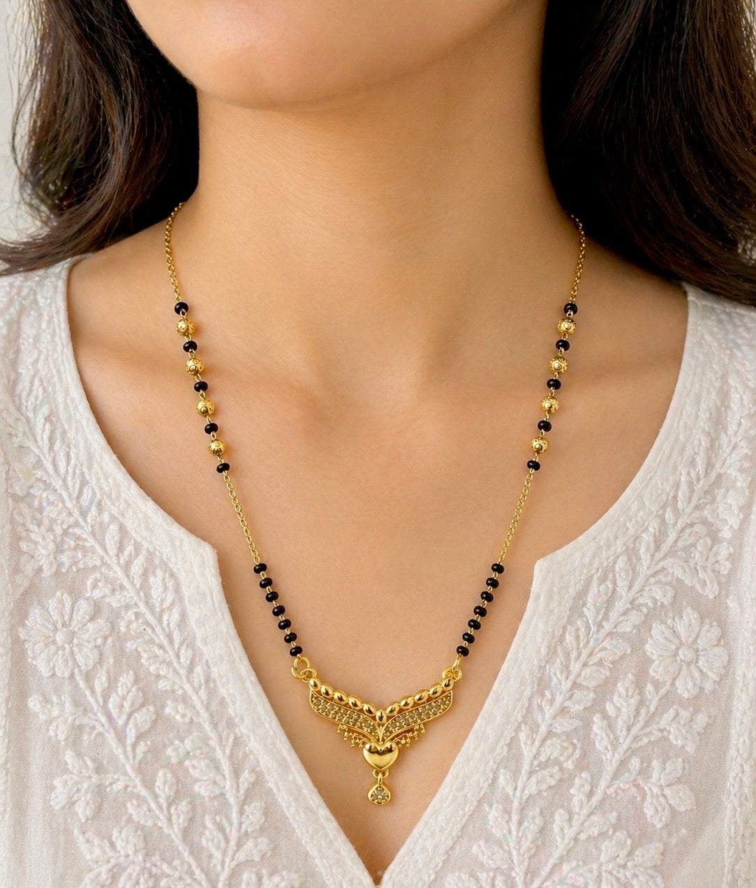 Elegant AD Winged Heart Mangalsutra Pendant – 18K Gold Plated