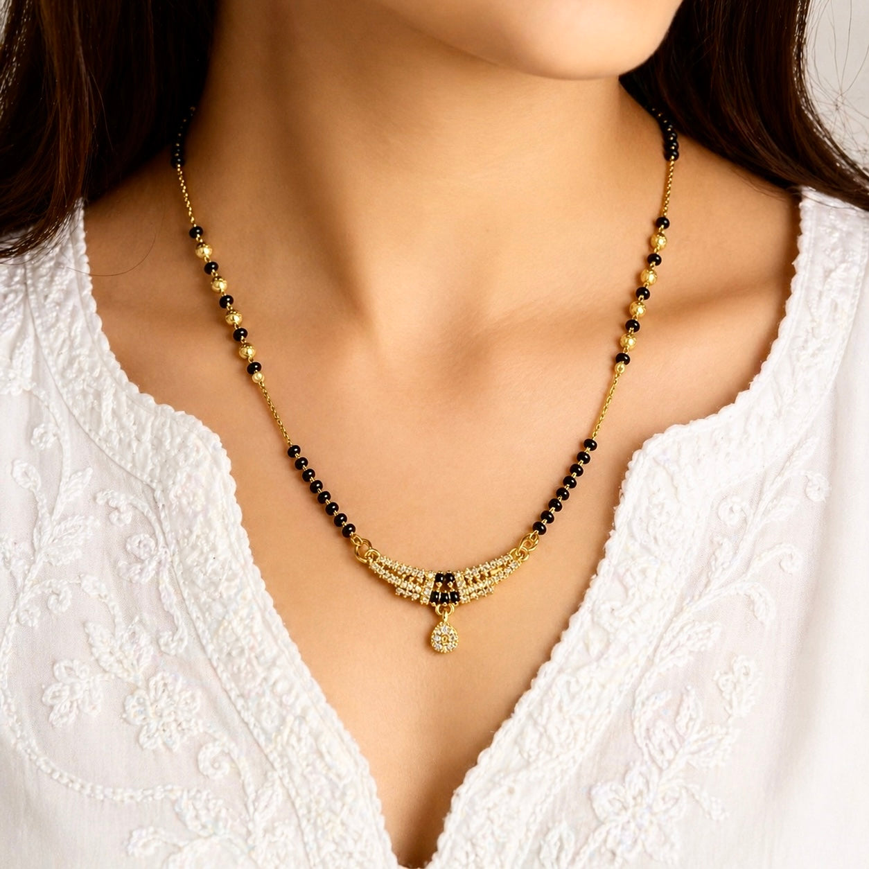 Premium Curved 18K Gold Plated AD Anti-Tarnish Mangalsutra Pendant with Black Stone Accents